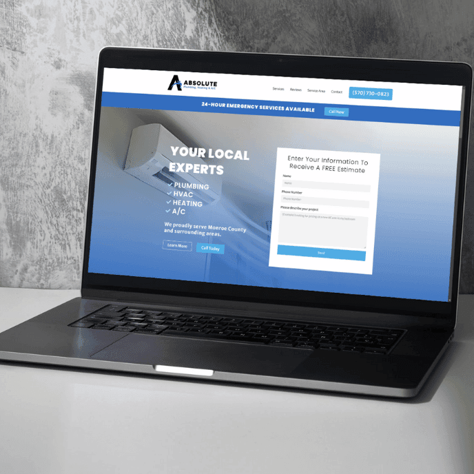 Absolute Plumbing website mockup on laptop